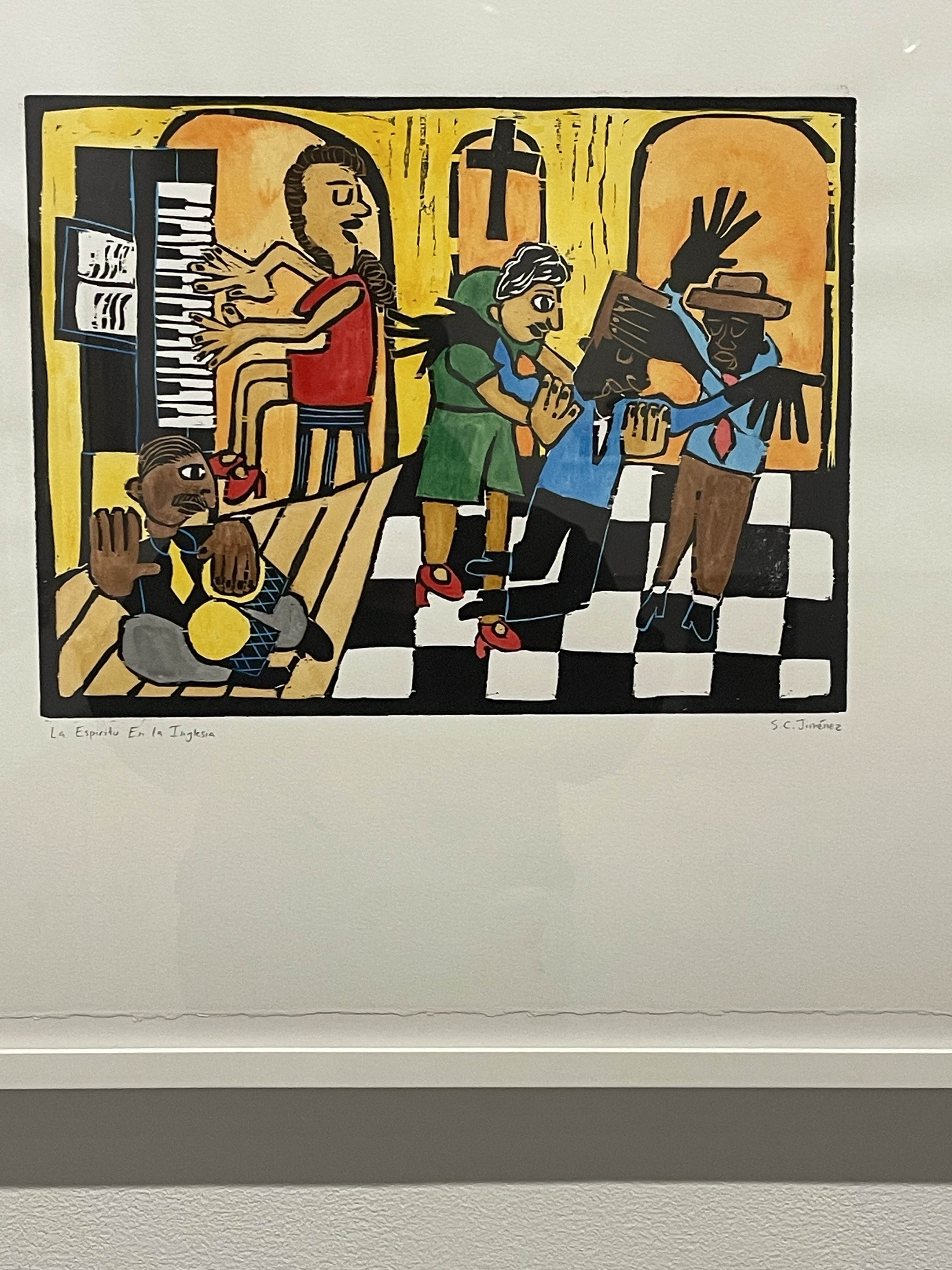 Bold, blocky figures clapping and dancing in a church while a pianist plays; black-and-white checkered floor